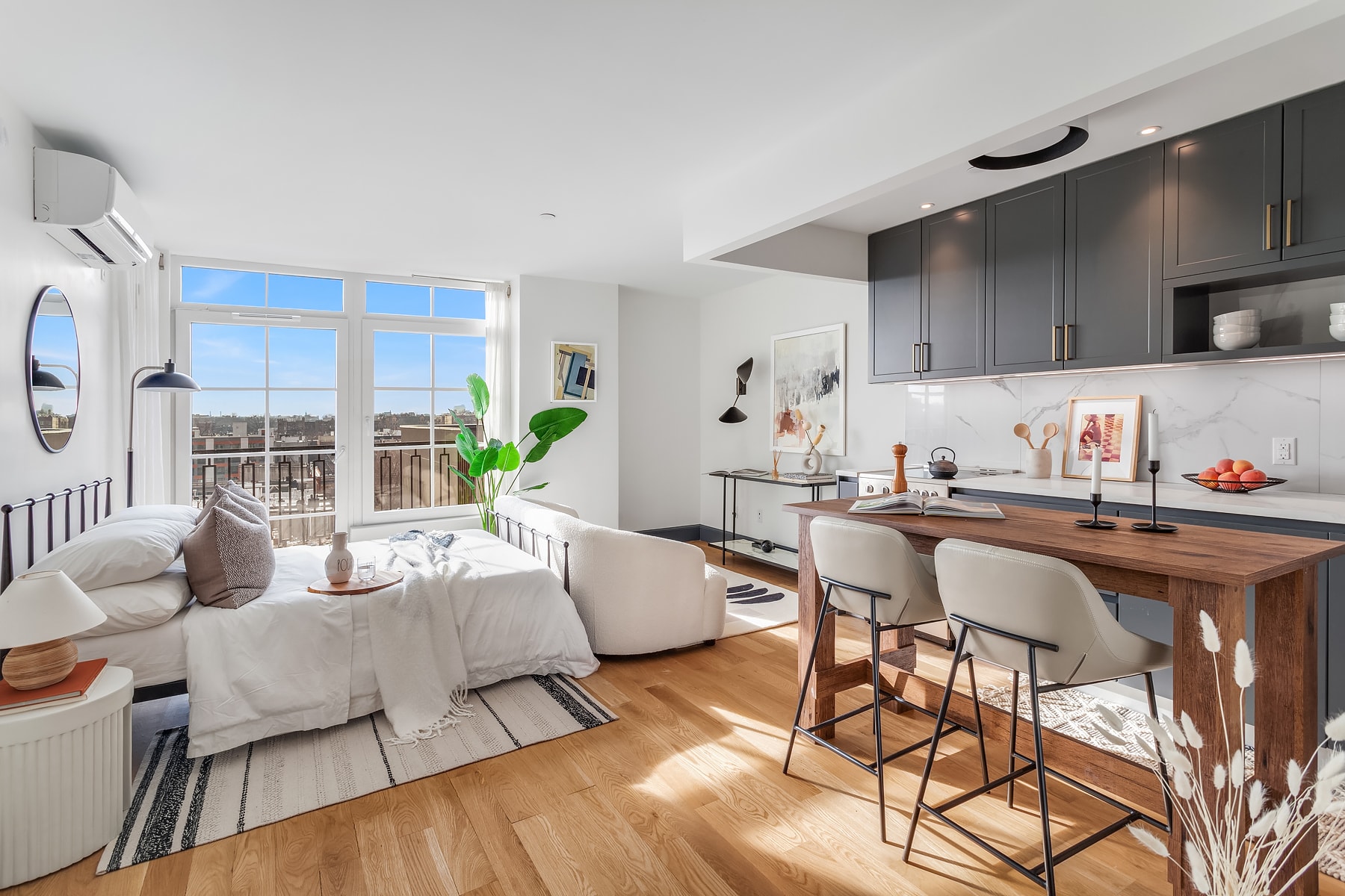 Large Brooklyn Studio Apartment For Rent in Bed-Stuy Neighborhood With French Windows and City Views